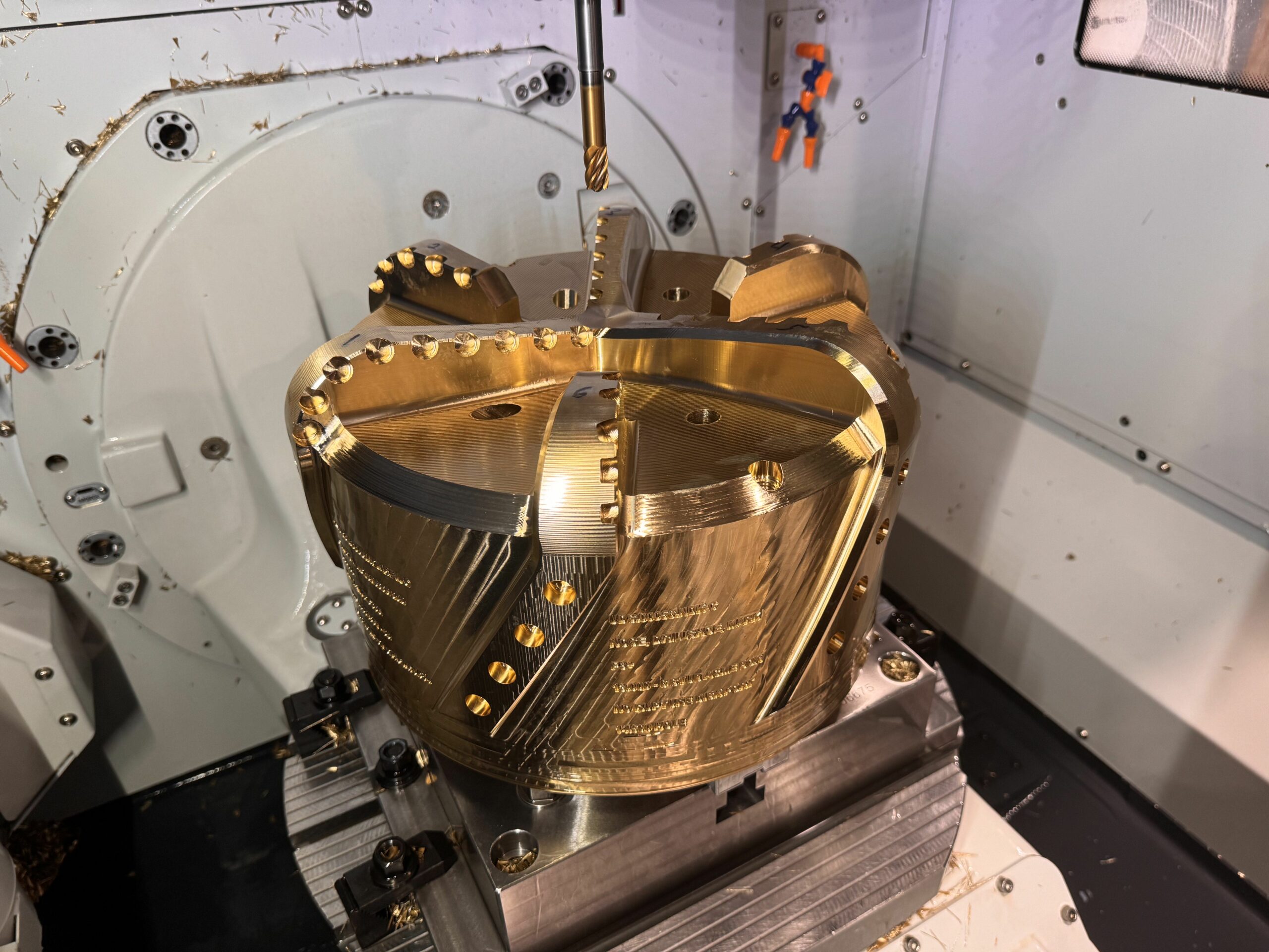 Large drill shoe in DVF-5000 5-axis milling machine after machining process